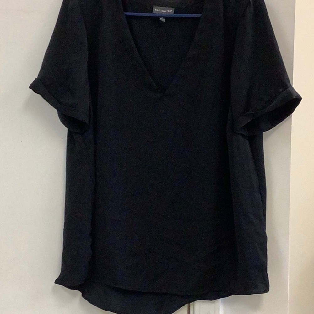 Black size XL, polyester blouse.